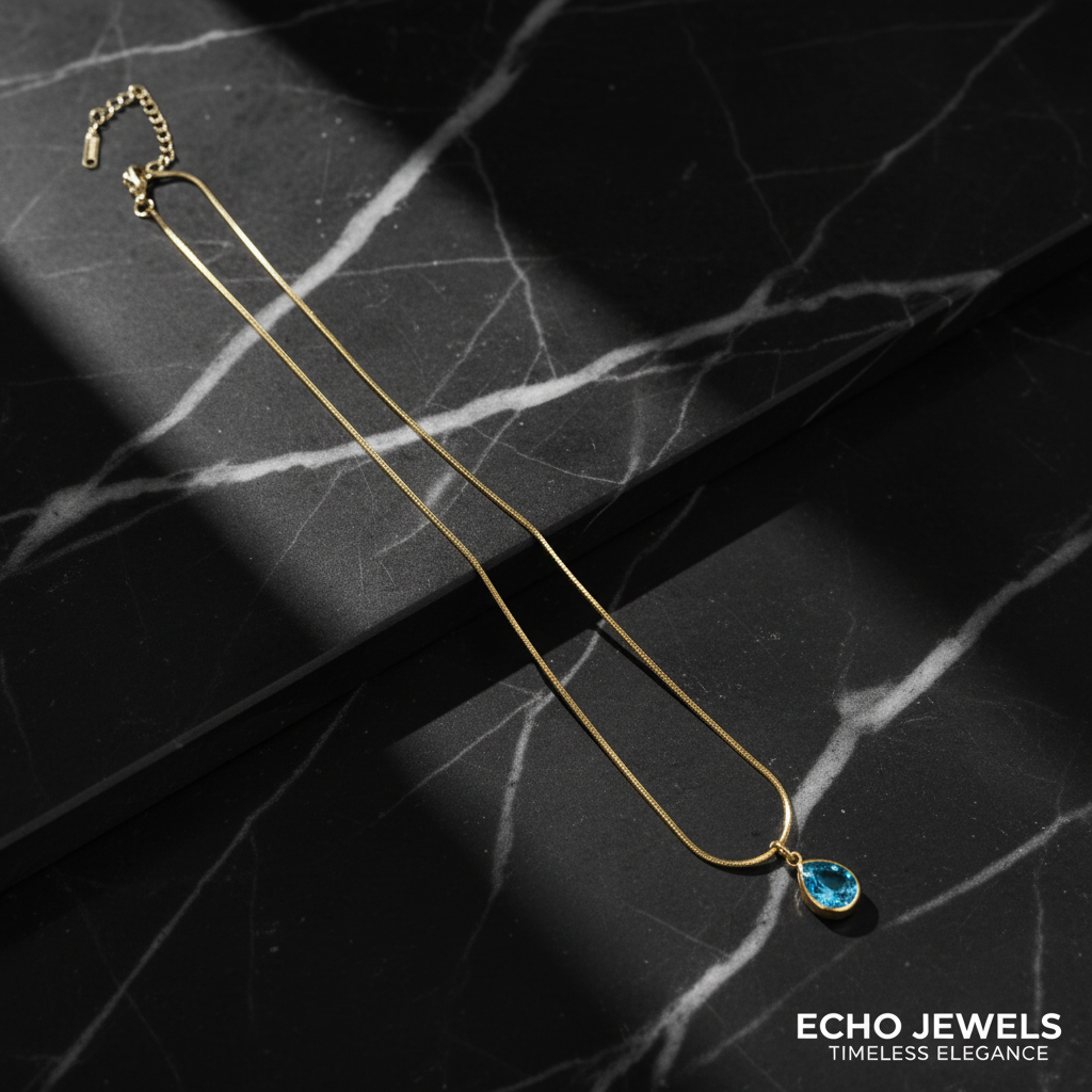 Golden Serenity Blue Topaz Teardrop Pendant Necklace